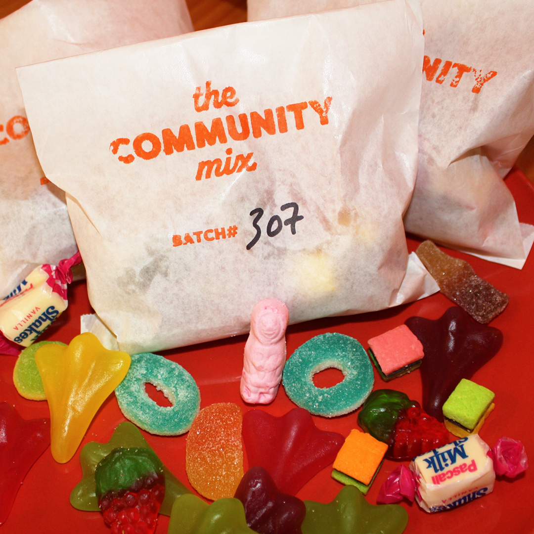 A paper bag of lollies from Community Burgers